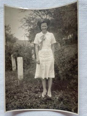 Vintage Woman in GraveYard 1940s Black & White smiling Photograph In Dress & Hat
